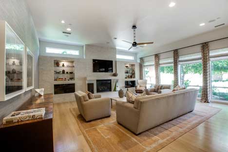 white oak flooring is the backdrop for this kitchen
